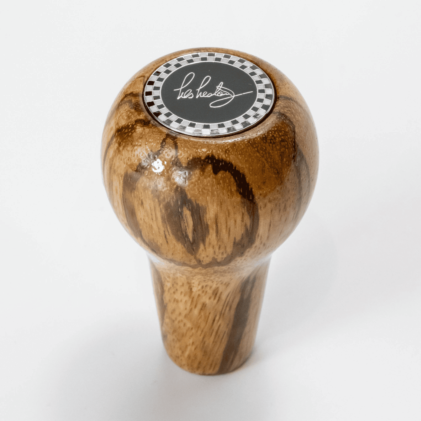 Front view of Les Leston Dakar wooden gear knob handcrafted in England from solid Zebrano wood with distinctive striped grain for classic sports cars, GT cars and historic racing vehicles