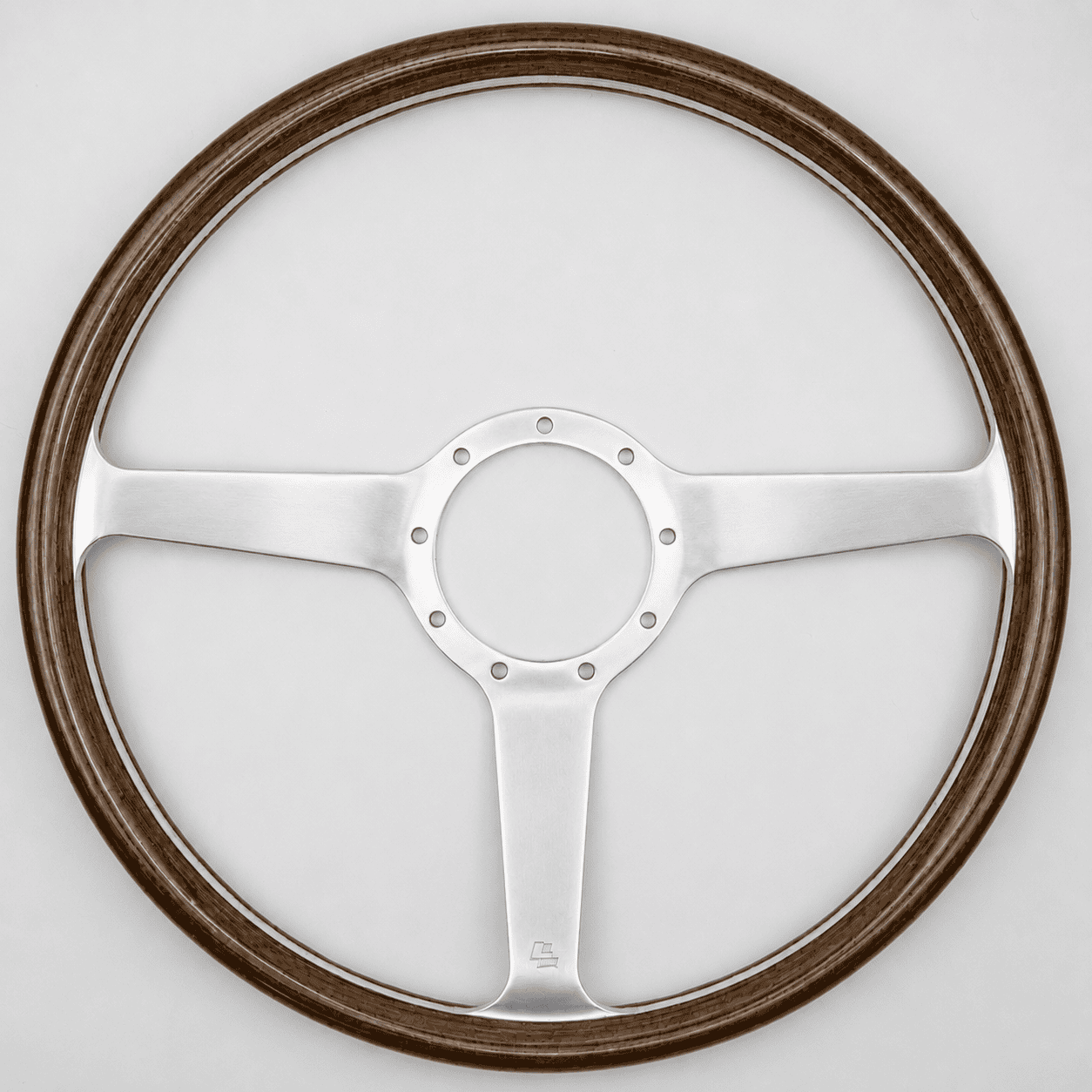 Front view of 15-inch Les Leston Monte Carlo Mk5 wooden steering wheel with deep dished profile, solid polished alloy spokes and period-correct design for classic sports and racing cars. 3 and 9 o'clock spokes