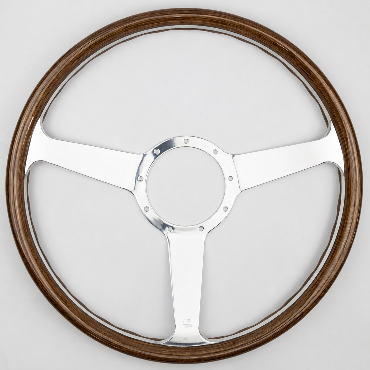 Front view of the Monte Carlo MK6 classic wooden steering wheel with a walnut wood rim, brushed aluminium three-spoke design and 6-bolt mounting pattern.