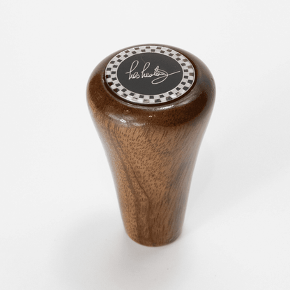 Front view of Les Leston Chevron mahogany wooden gear knob handcrafted in England with a distinctive triangular profile for classic sports cars, GT cars and historic racing vehicles