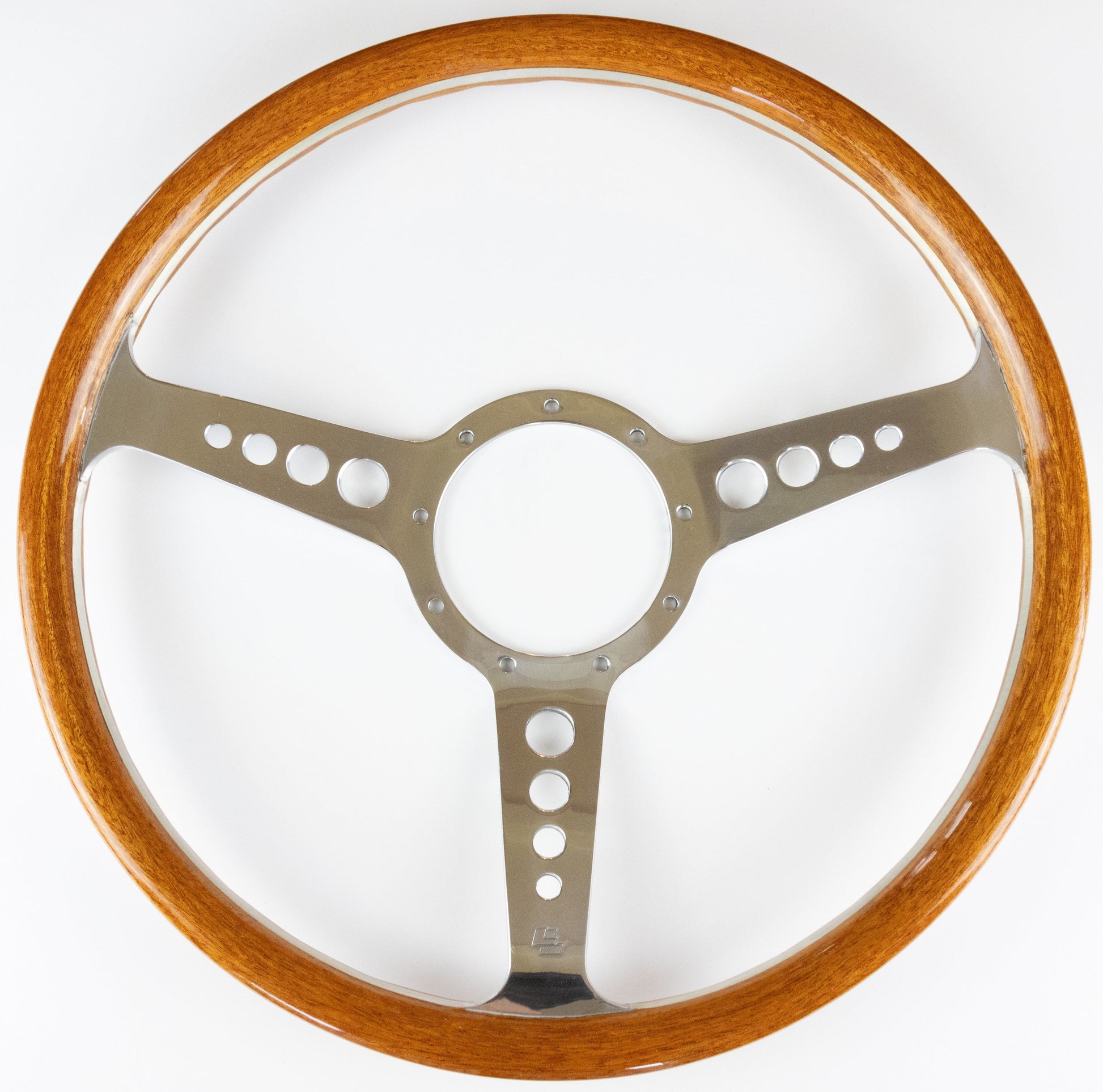 Front angle view of Les Leston Grand Prix Mk5 wooden steering wheel with polished alloy spokes and classic period-correct design for vintage sports cars