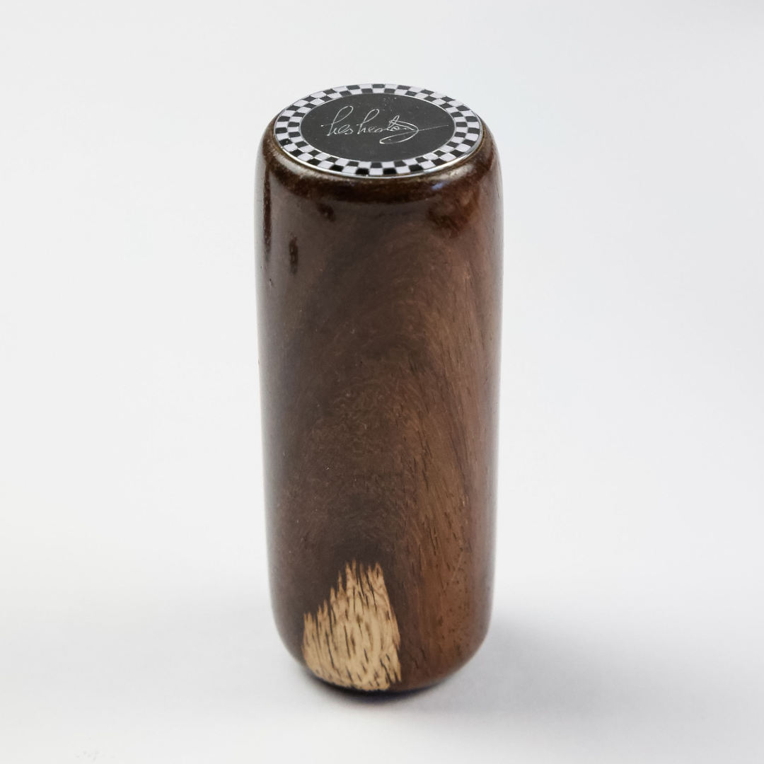 Front view of Les Leston Monoposto wooden gear knob handcrafted in England from Indian rosewood with a long slender profile for classic sports cars, GT cars and historic racing vehicles
