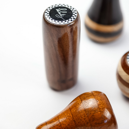 Close up of Les Leston Monoposto Indian rosewood wooden gear knob showing the long slender profile, rich wood grain and handcrafted finish for classic sports cars, GT cars and historic racing vehicles