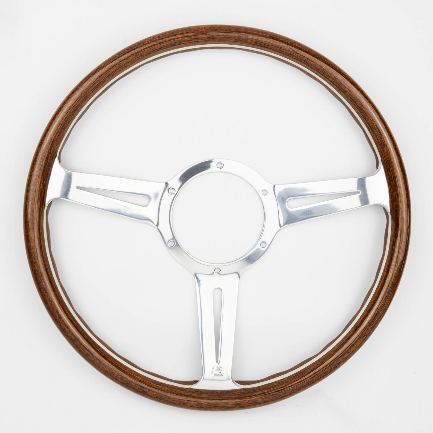 Front angled view of 15-inch Les Leston Monte Carlo mahogany steering wheel with dished design and polished metal spokes fitted for AC Ace