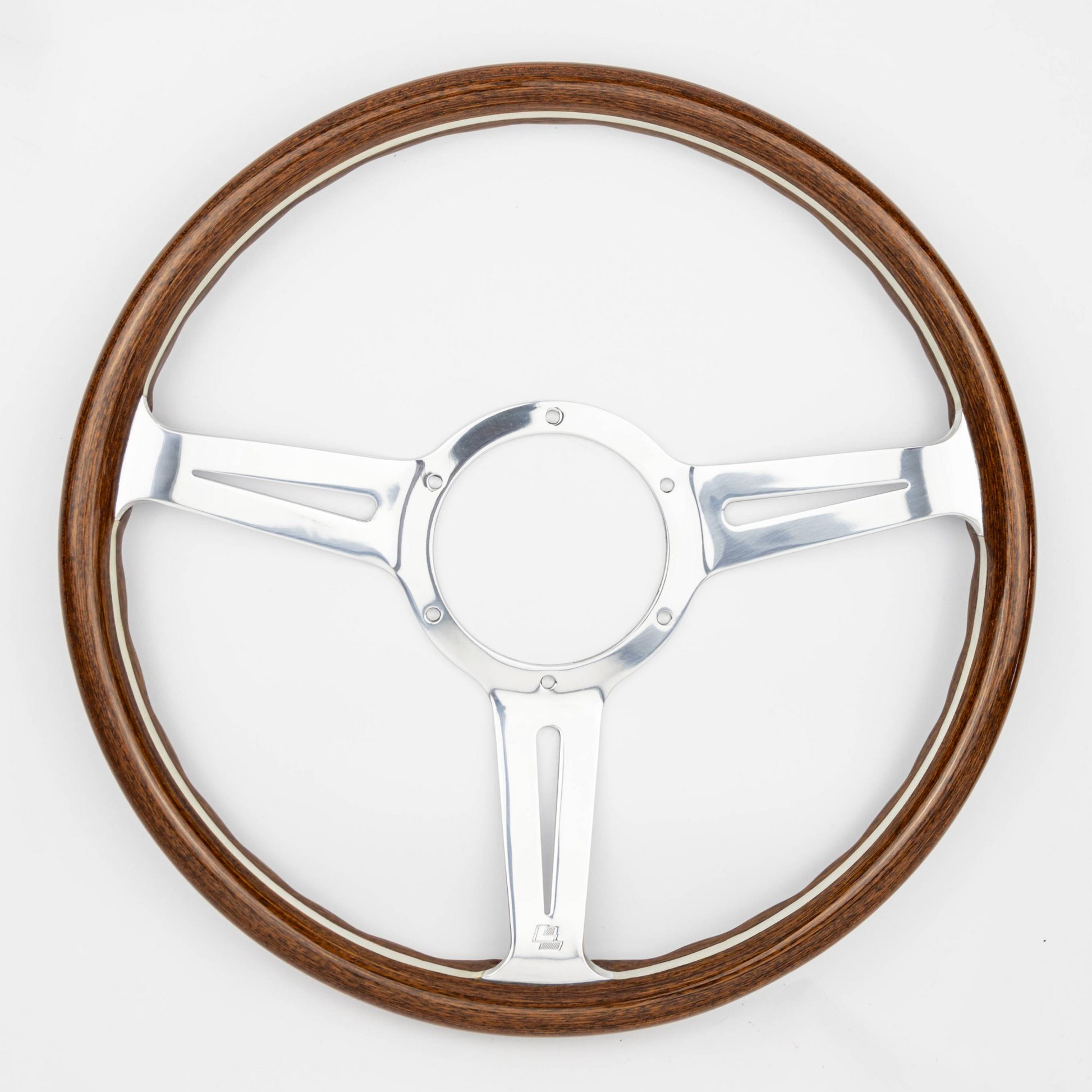 Front angled view of 15-inch Les Leston Monte Carlo mahogany steering wheel with dished design and polished metal spokes fitted for AC Ace