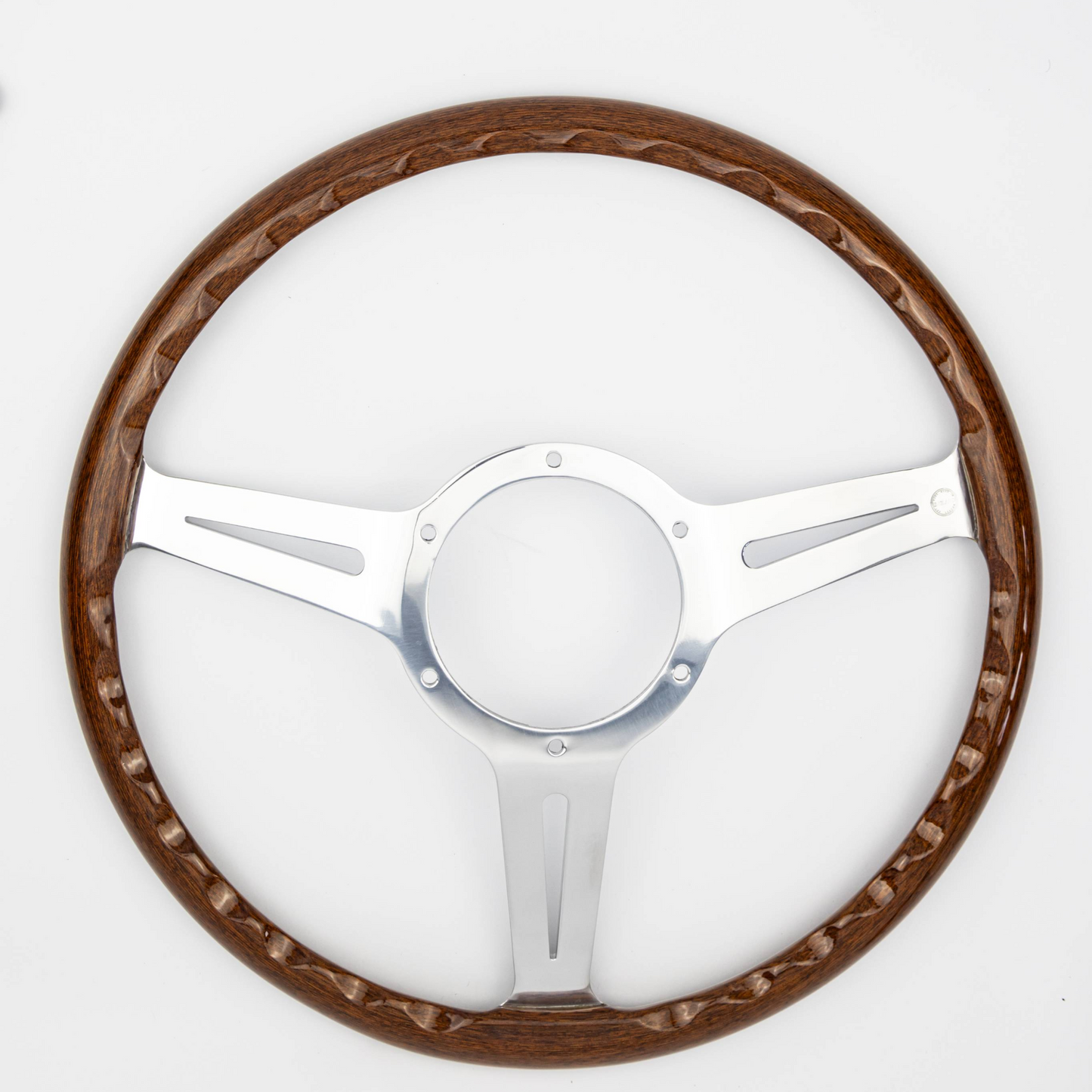 Rear view of 15-inch Les Leston Monte Carlo mahogany steering wheel showing spoke mounting points and construction detail for AC Ace fitment