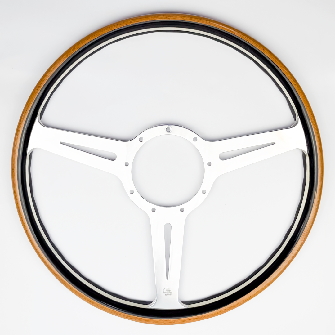 Front view of Les Leston Monte Carlo 15 inch wooden steering wheel handcrafted in England from contrasting black oak and teak
