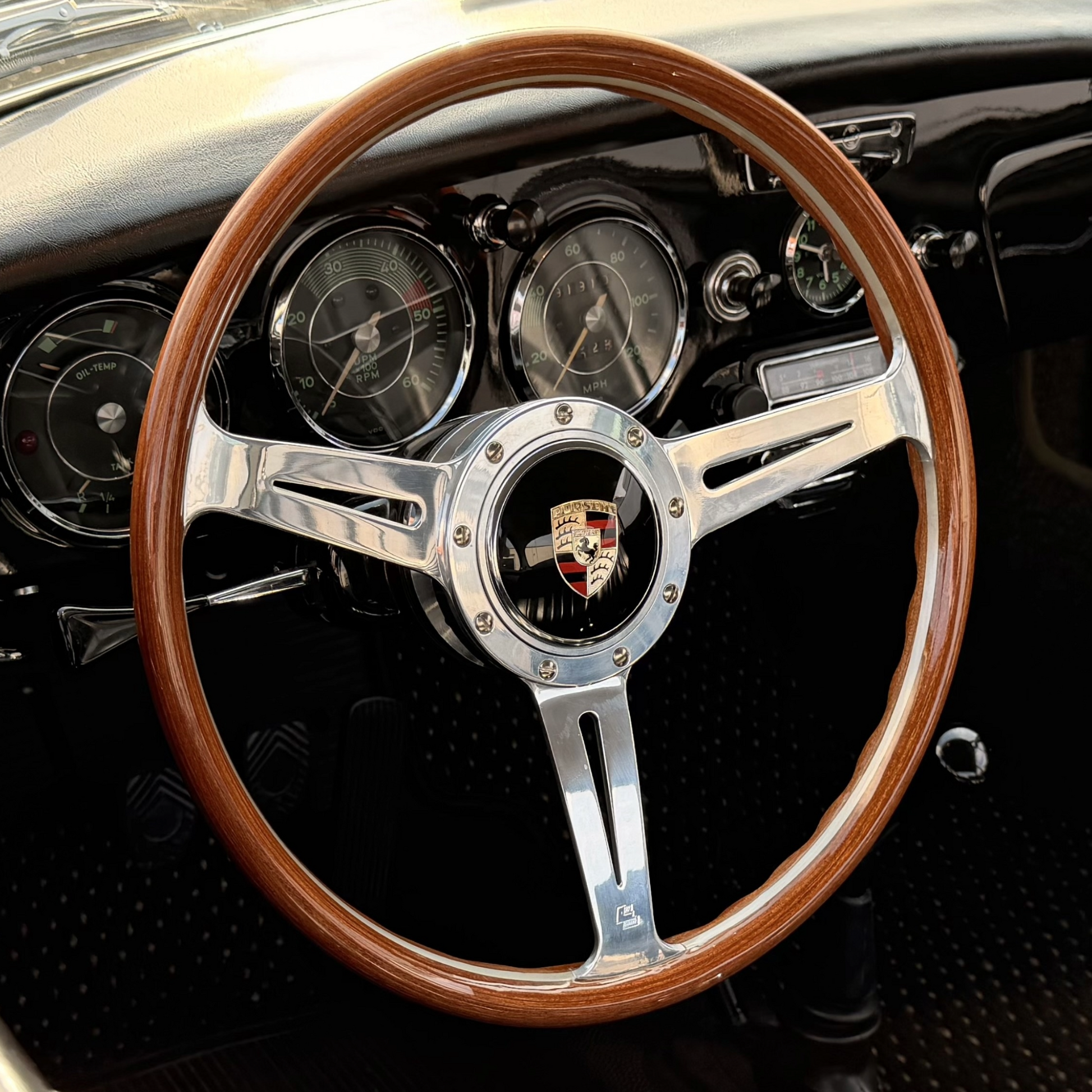 Les Leston Monte Carlo dished steering wheel with Porsche horn button fitted in a classic Porsche 356 interior