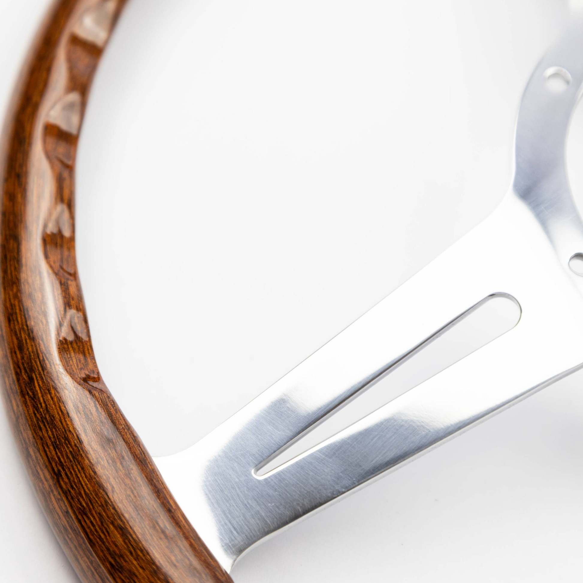 Close-up of polished metal spokes on 15-inch Les Leston Monte Carlo mahogany steering wheel