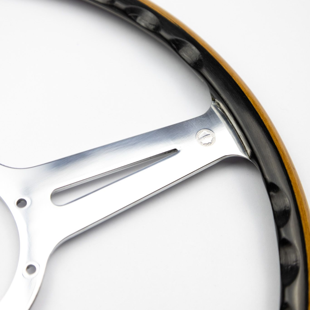 Rear view of Les Leston Monte Carlo 15 inch steering wheel showing the handcrafted black oak and teak wooden rim and polished alloy construction