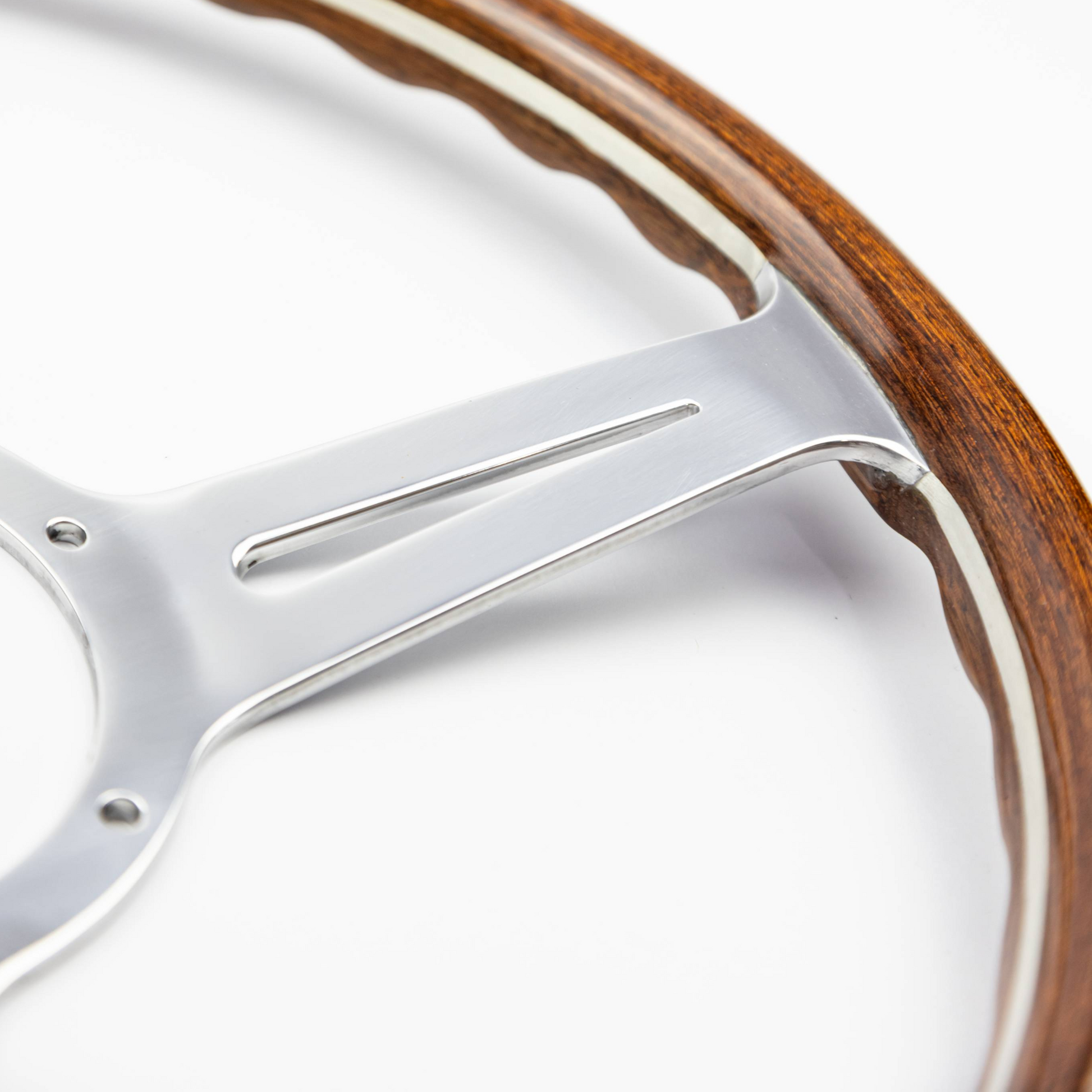 Side profile view of 15-inch Les Leston Monte Carlo steering wheel showing dished slant, rim curvature, and angled frame construction for improved driving ergonomics