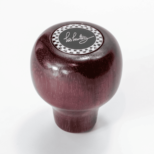 Close up of Les Leston Purple Patch wooden gear knob showing the natural Purpleheart wood grain and handcrafted finish for classic sports cars, GT cars and historic racing vehicles