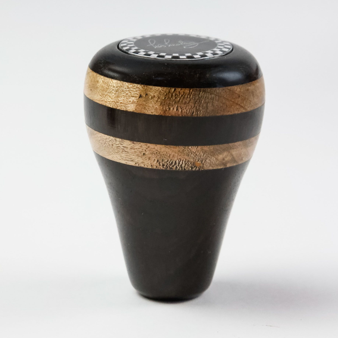 Front view of Les Leston wooden gear knob handcrafted in England from striped ebony and beech wood for classic sports cars, GT cars and historic racing vehicles