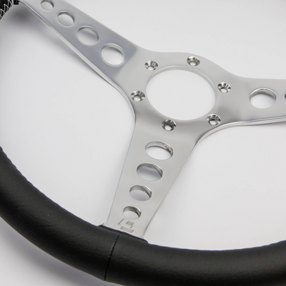 Side profile of a Les Leston 14-inch dished leather steering wheel showing the dish depth