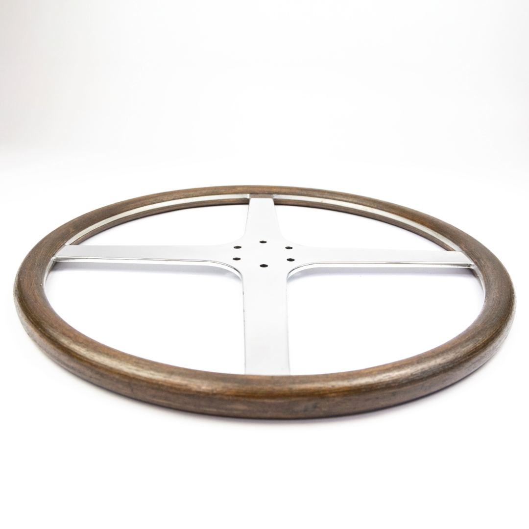 Side profile of Rene 4 Spoke mahogany wooden steering wheel showing slim rim without finger grooves and traditional Danish oil finish