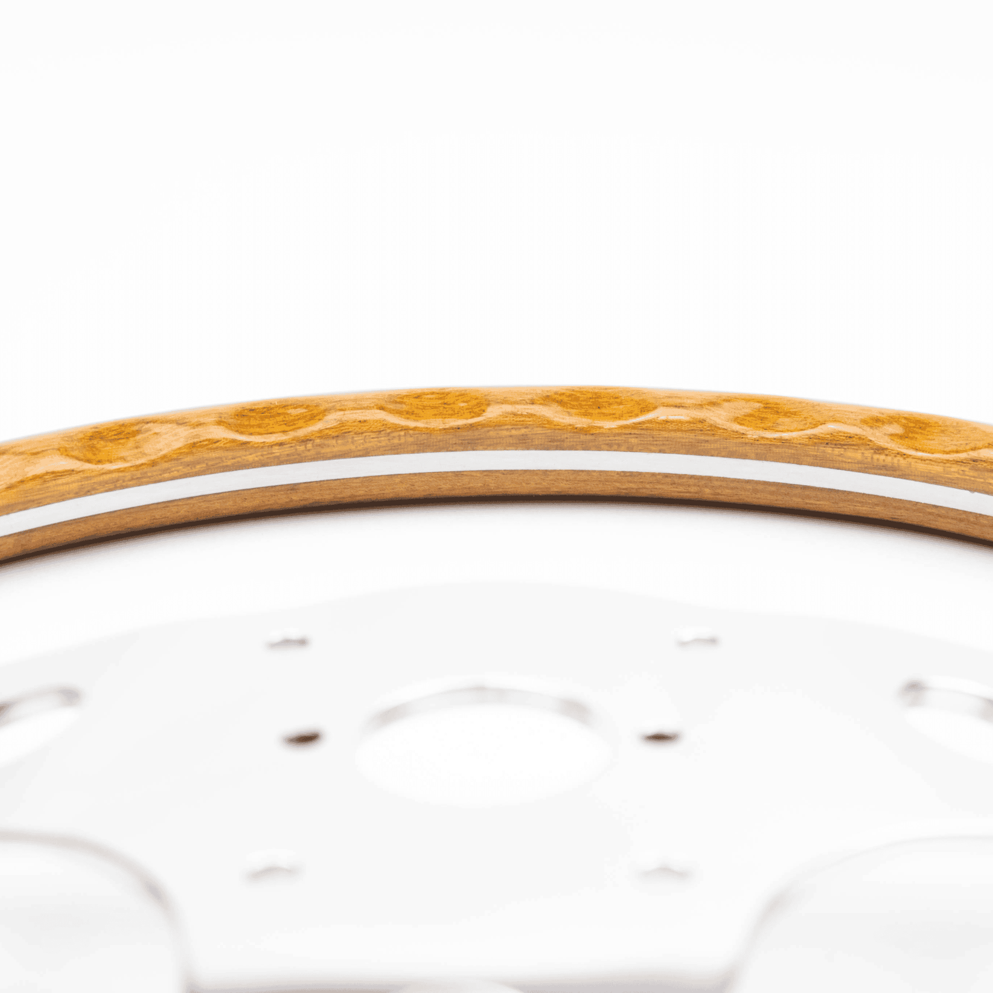 Close-up of rim detail on Les Leston Grand Prix 13-inch steering wheel showing material finish and craftsmanship