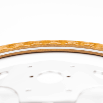 Close-up of rim detail on Les Leston Grand Prix 13-inch steering wheel showing material finish and craftsmanship