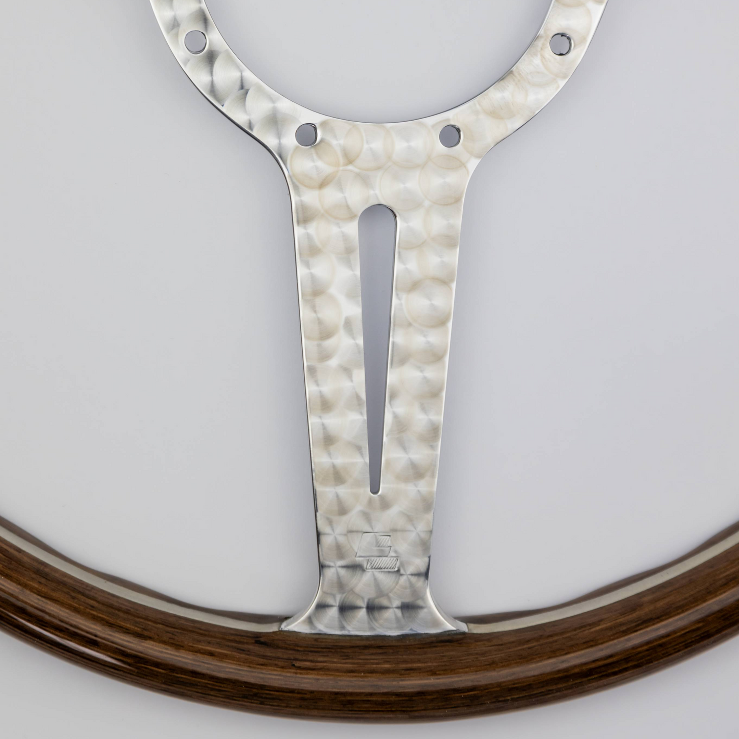 Close-up of the LL stamp on the engine turned aluminium frame of the Les Leston Monte Carlo steering wheel