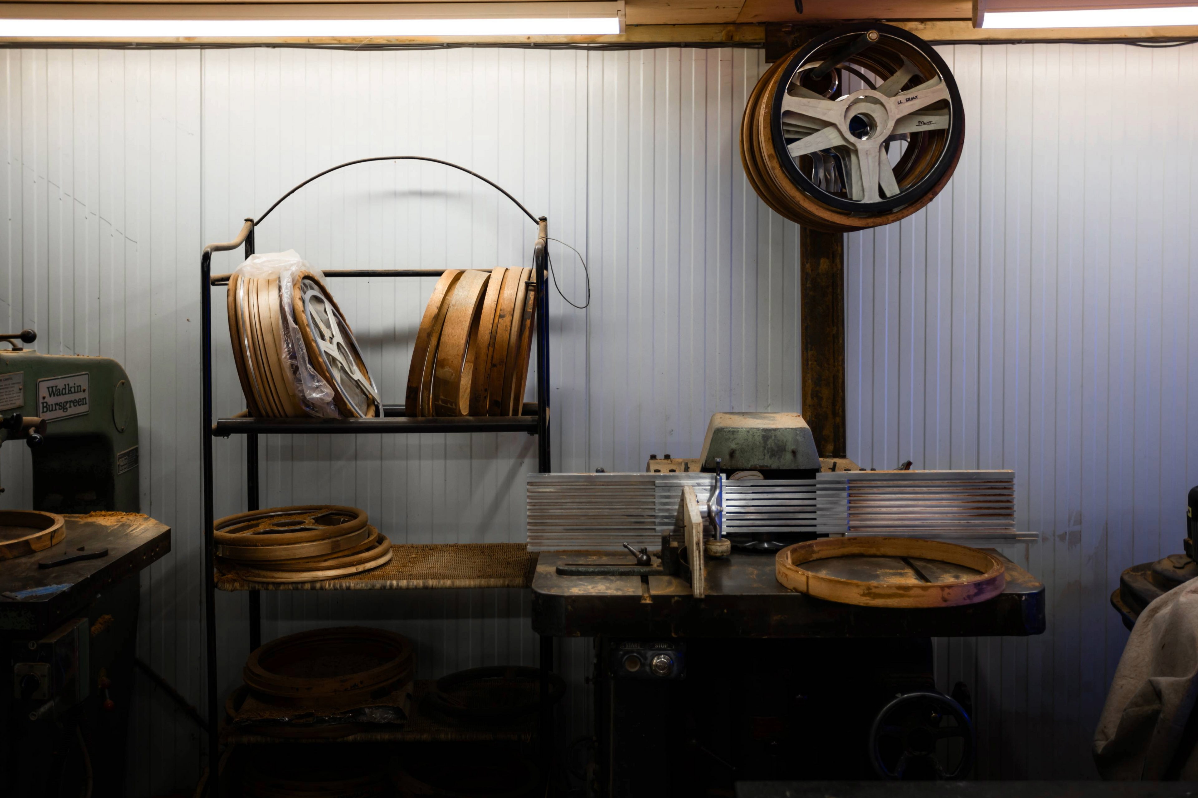 Les Leston manufacturing workshop showing steering wheel production area and handcrafted British motorsport component assembly