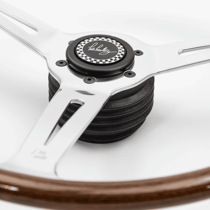 Front angled view of 15-inch Les Leston Monte Carlo steering wheel with slotted aluminium spokes for Momo boss
