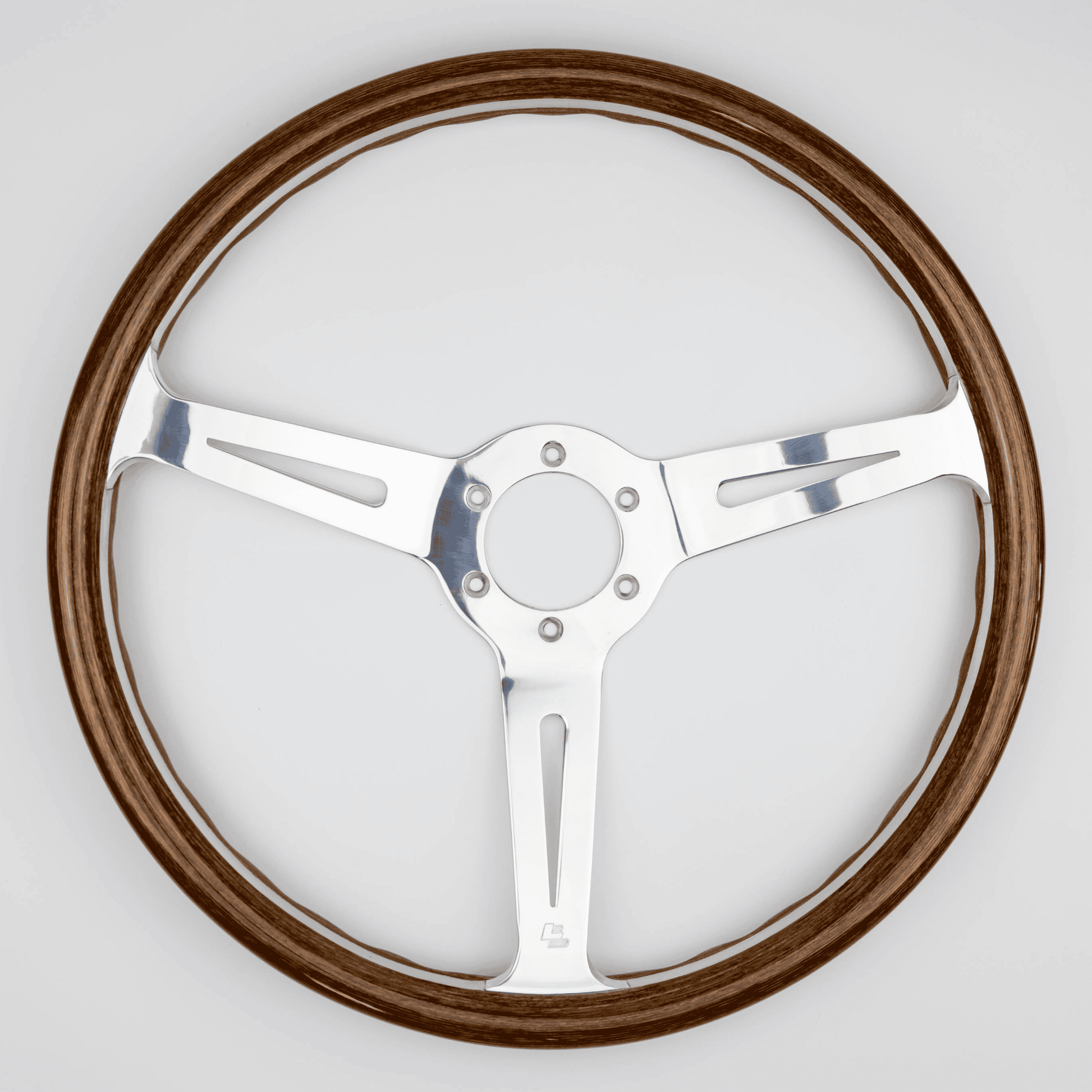 Front view of 15-inch Les Leston Monte Carlo steering wheel highlighting handcrafted wood rim and slotted aluminium spokes