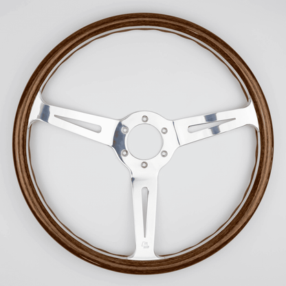 Front view of 15-inch Les Leston Monte Carlo steering wheel highlighting handcrafted wood rim and slotted aluminium spokes