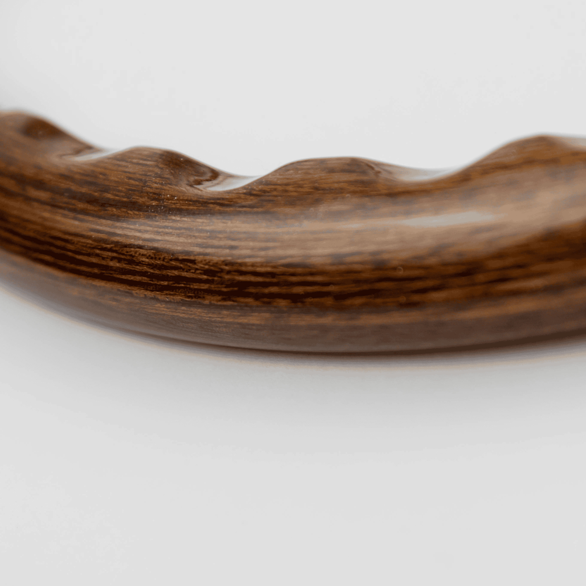 Angled view of finger slot detailing on 15-inch Les Leston Monte Carlo steering wheel showing handcrafted rear grip