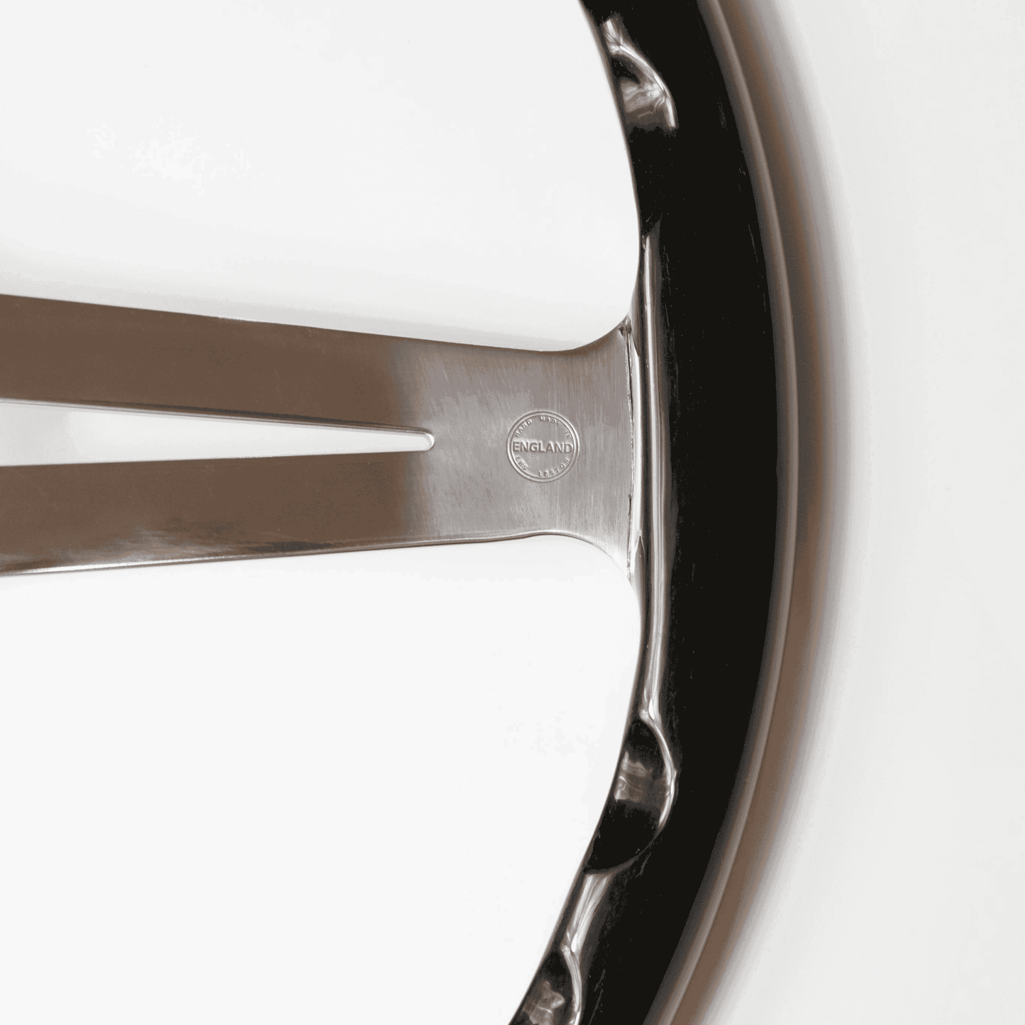 Close-up of Made in England stamp on Les Leston Monte Carlo 15-inch flat black oak steering wheel confirming British manufacture