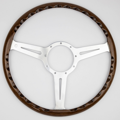 Rear view of the Les Leston Monte Carlo 15-inch walnut steering wheel showing the spoke construction and mounting holes