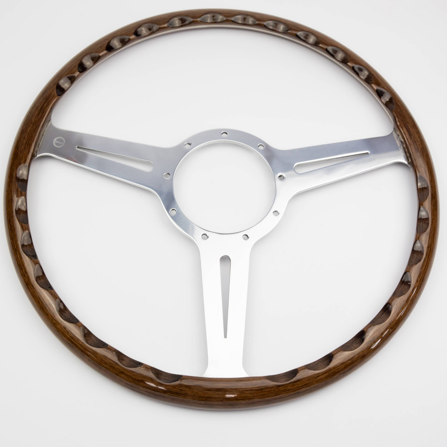 Side profile of the Les Leston Monte Carlo 15-inch walnut steering wheel showing the dish depth