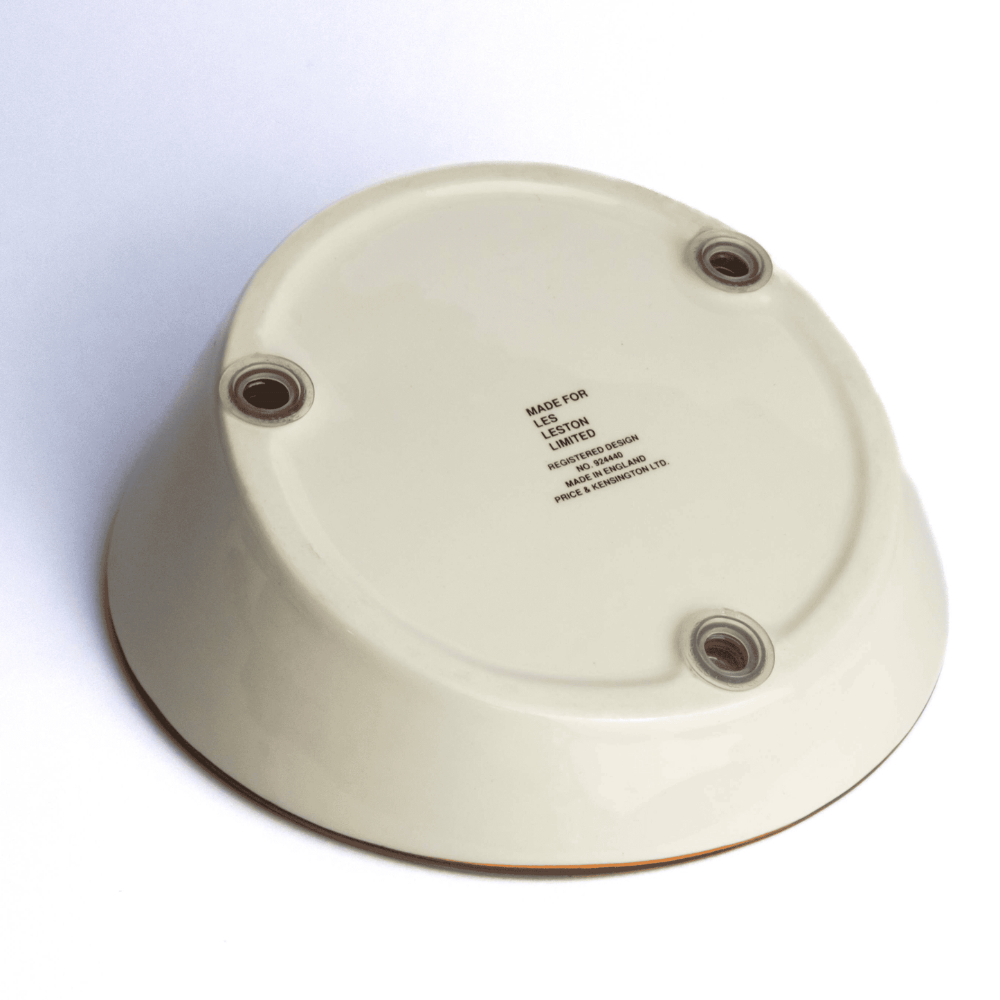 Underside detail of Les Leston steering wheel ashtray showing construction and mounting base