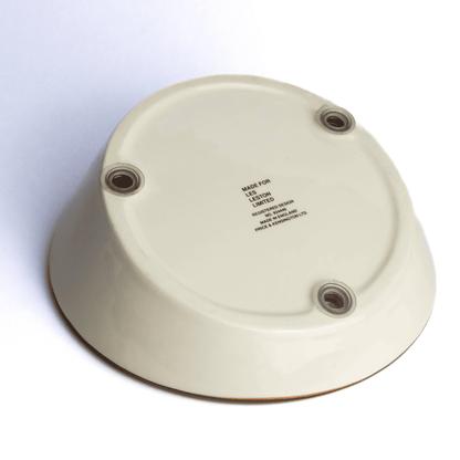 Underside detail of Les Leston steering wheel ashtray showing construction and mounting base