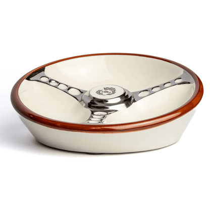Les Leston steering wheel ashtray showing classic automotive design and polished finish