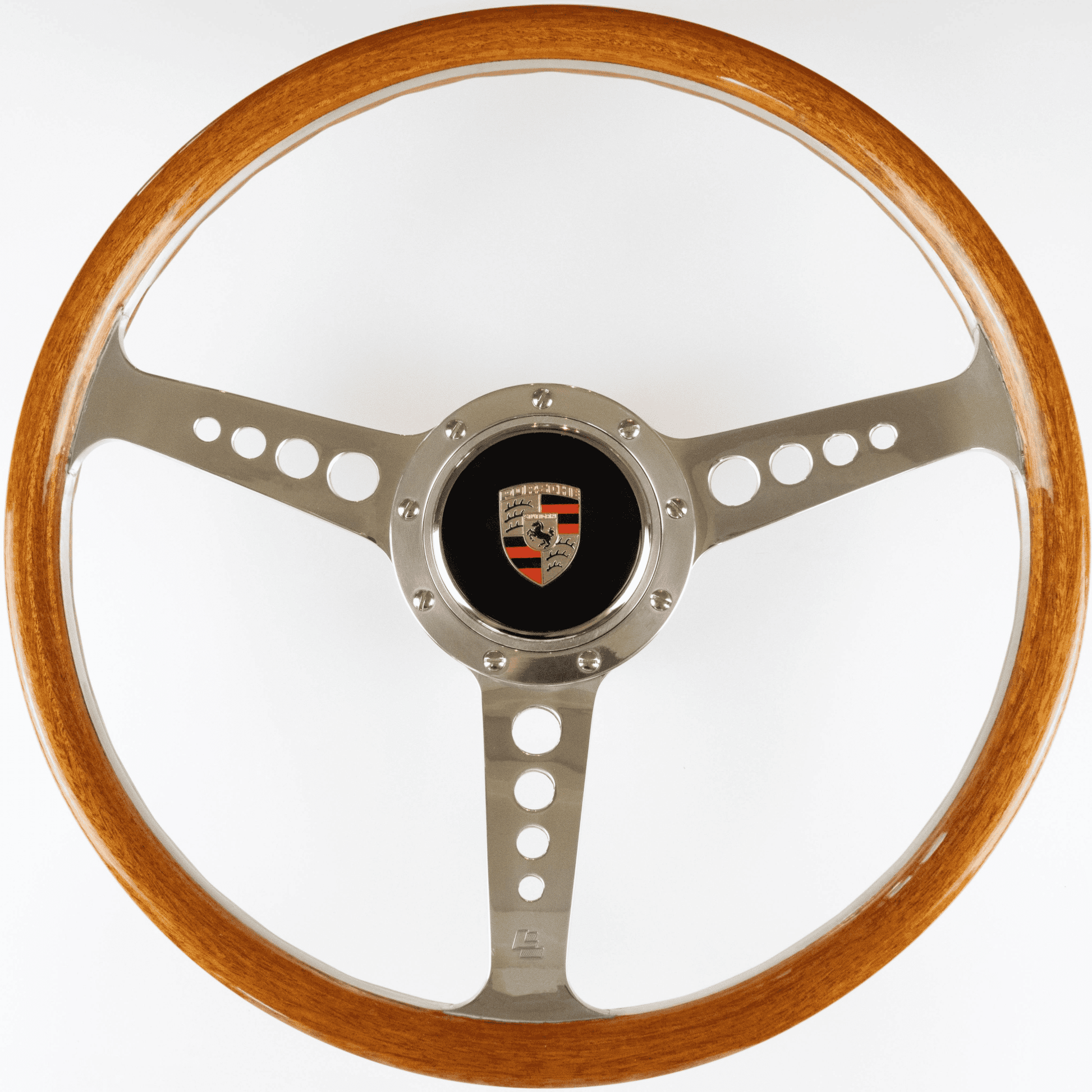 Angled view of Porsche steering wheel boss hub with steering wheel fitted showing installation and driving position